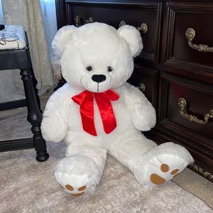 Big white bear with red bowtie